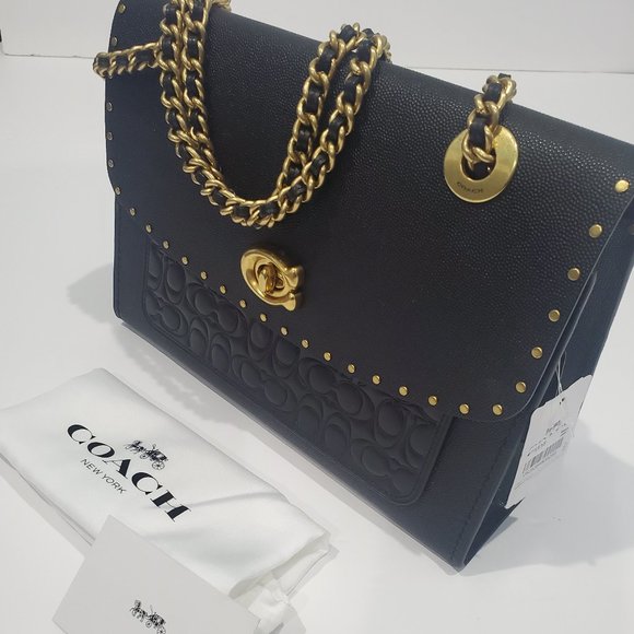 coach parker shoulder bag in signature leather with rivets